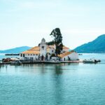 Idyllic view of Vlacherna Monastery on a sunny summer day in Corfu, Greece.